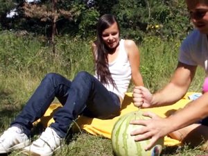 Small titted cutie tastes watermelon and cock